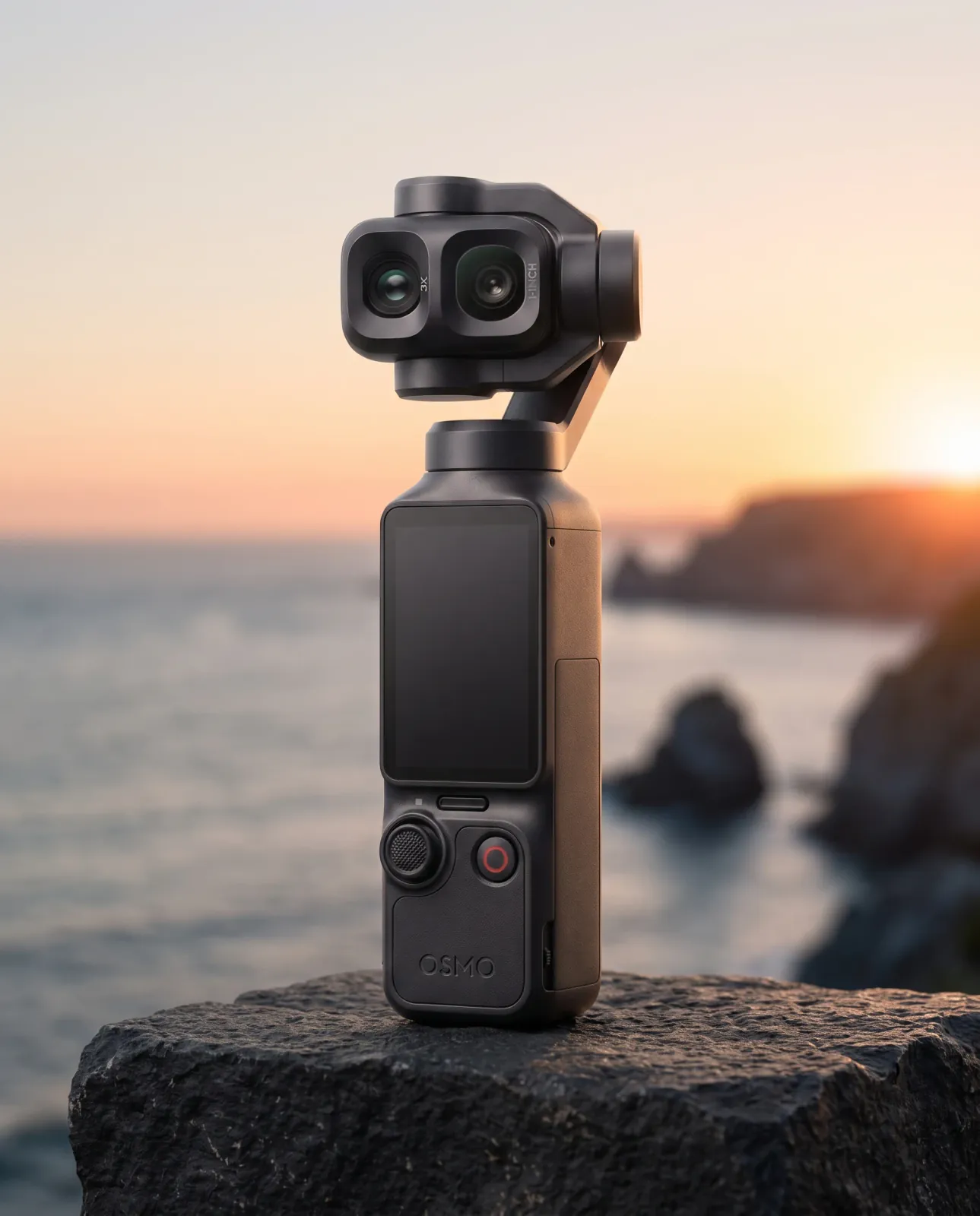 The same black DJI Osmo Pocket 4P dual-camera handheld gimbal camera in a golden-hour coastal campaign photograph.