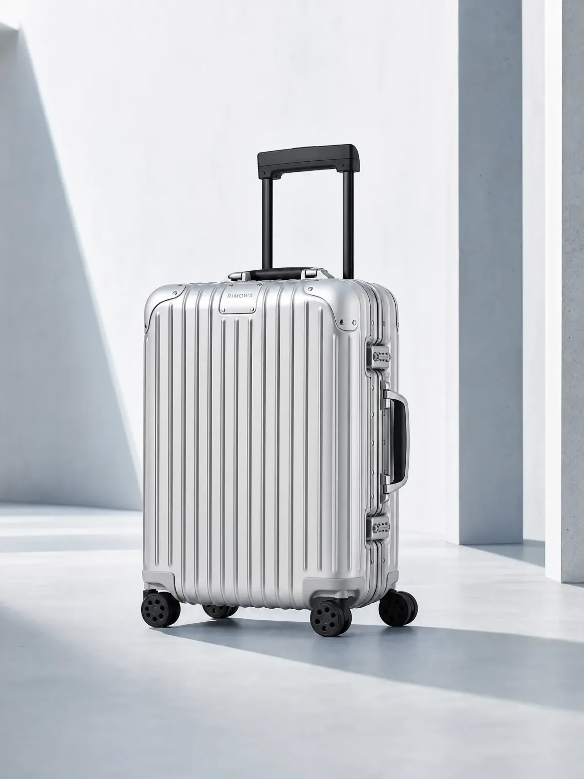 RIMOWA Original Cabin suitcase in a clean portrait product-page composition.