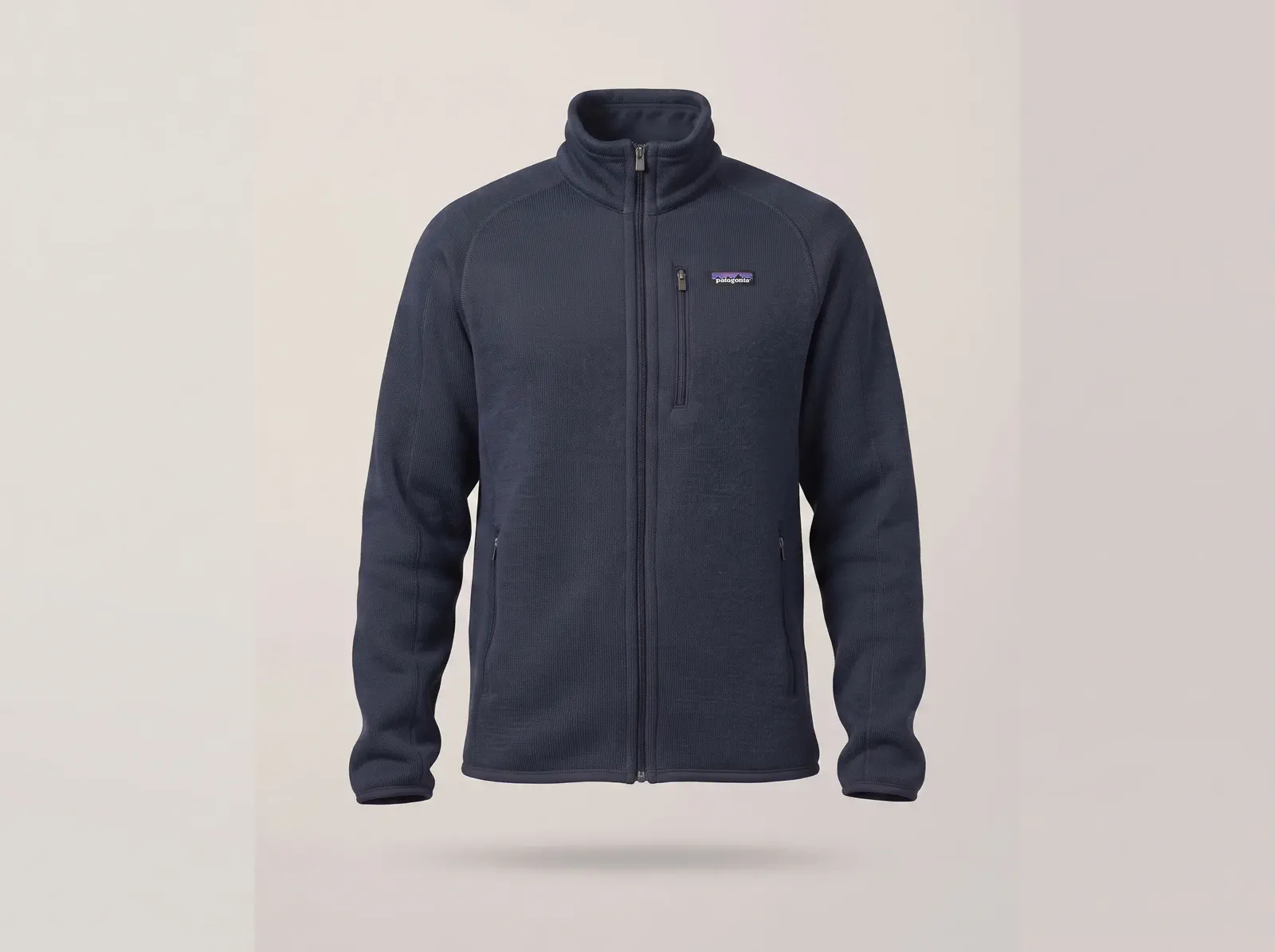 A knit jacket photographed so its stitch texture, collar, seams, and zipper remain readable.