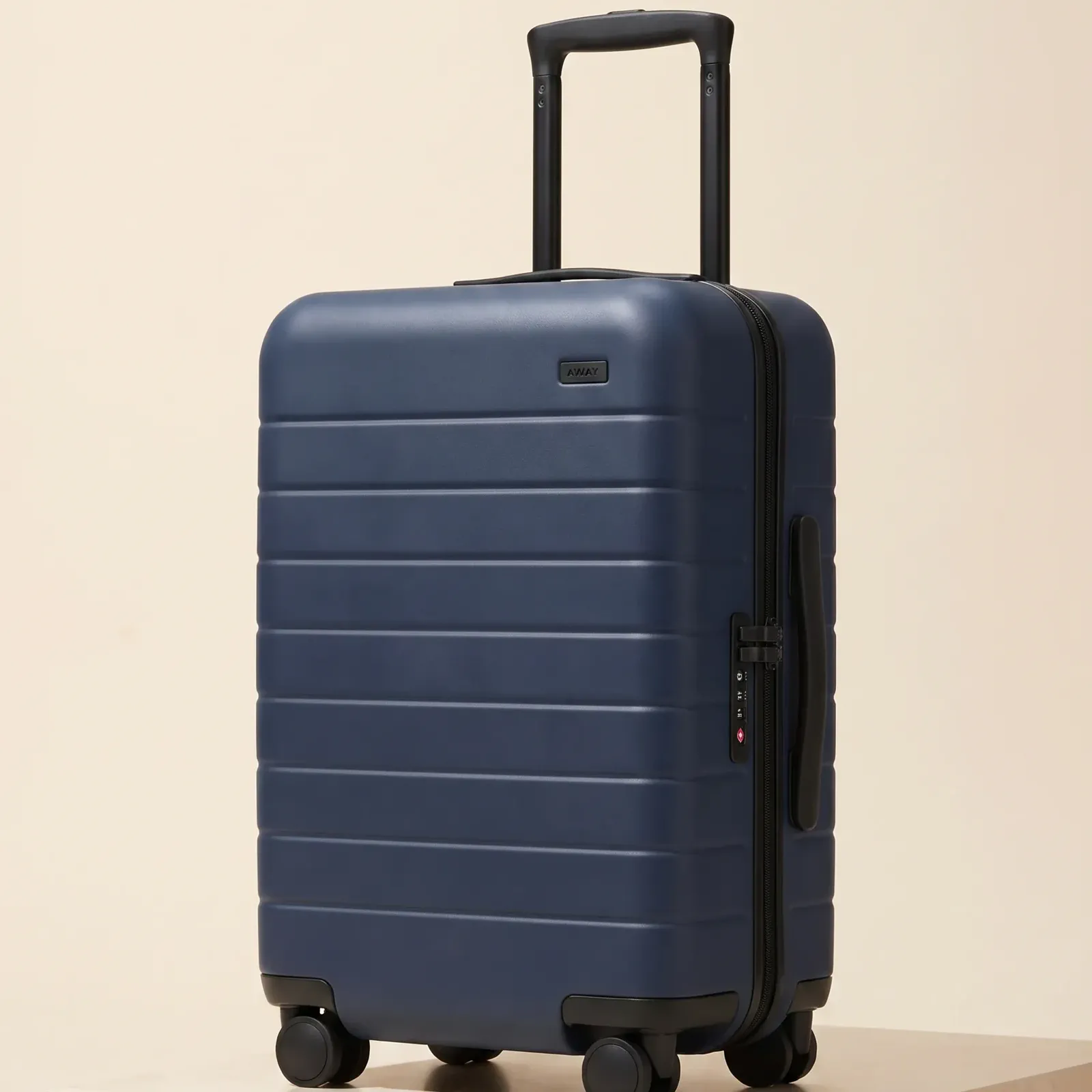 A square collection-browse crop that keeps a suitcase easy to scan at tile size.