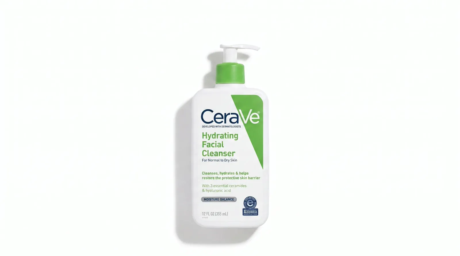 A pump-bottle cleanser on white with a wide soft shadow that adds gentle depth.