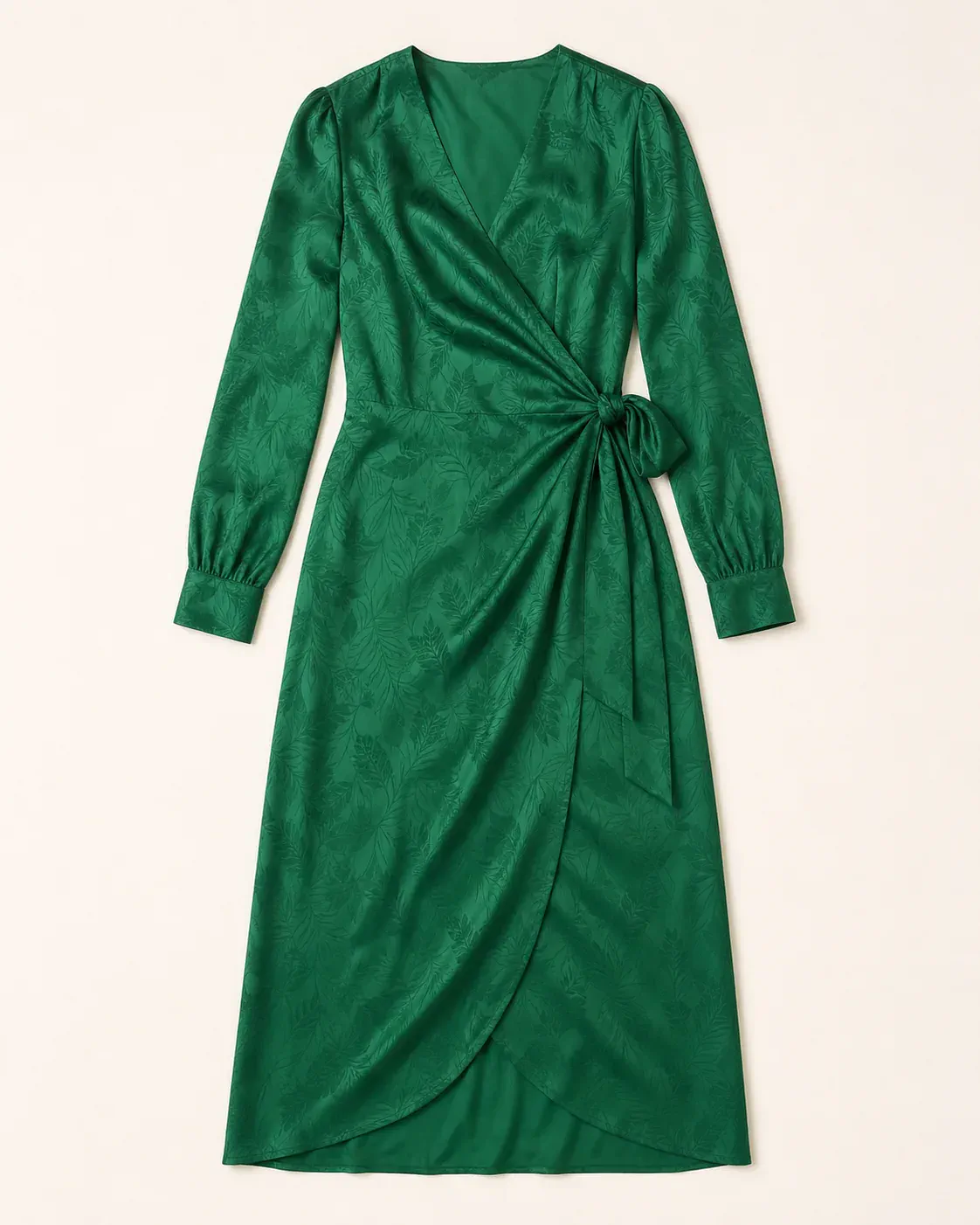 Emerald green jacquard satin wrap dress photographed as a clean flat lay.